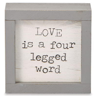 4 Inch White Wooden Plaque WIth Grey Border Featuring "Love is a Four Legged Word" Sentiment 