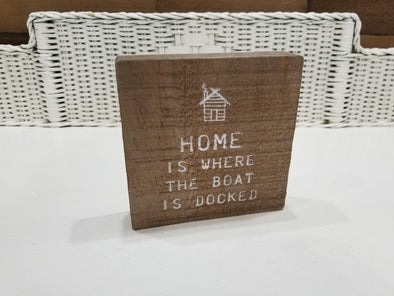 Distressed Wooden Box Sign Featuring "Home IS Where He Boat is Docked" Sentiment and a Home Design
