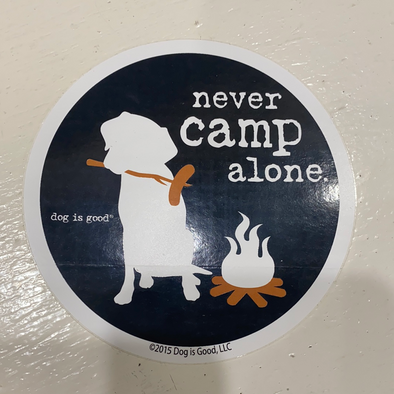 Black Vinyl Sticker With A Dog and Bonefire Wiith a Never Camp Alone Phrase