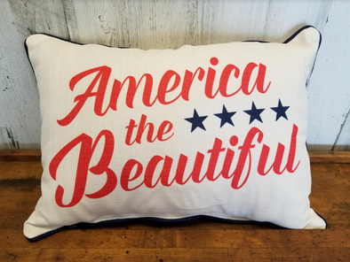 "20 Inch White Rectangular Pillow With Stars and Navy Piping Boarder Design and Red American the Beautiful Pharse"