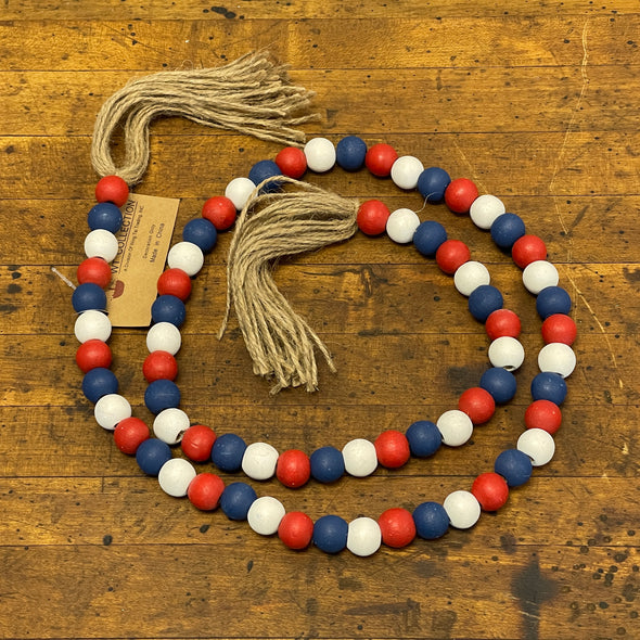 48 Inch Garland Featuring Red White Blue Americana Beads With Tassel Design At The Bottom