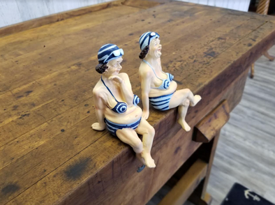 5.6 Inch Two Polyresin Ladies Sitting at the Beach Wearing Only a Skimpy Bikini Top and Sunglasses