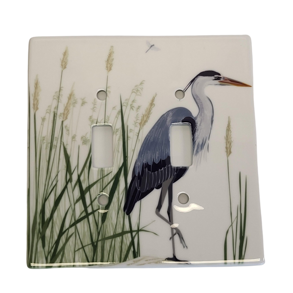 Double Ceramic Switchplate Featuring A Blue Heron Design With A Porcelain Double Toggle Including Four White-Headed Screws