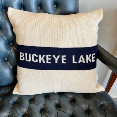 White Knit Pillow Featuring Buckeye Lake Text At The Center With Blue Background