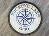 23 Inch Round Wooden Barrel End Wall Decor Featuring "Buckeye Lake Ohio" Sentiment with Compass Rose Design