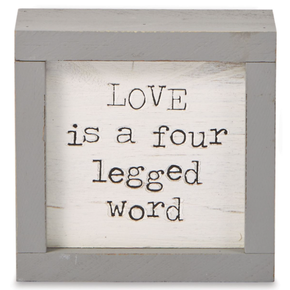 4 Inch White Wooden Plaque WIth Grey Border Featuring "Love is a Four Legged Word" Sentiment 