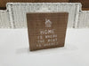 Distressed Wooden Box Sign Featuring "Home IS Where He Boat is Docked" Sentiment and a Home Design