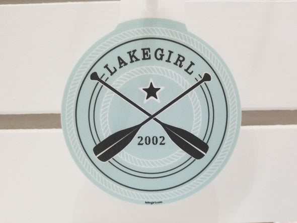 Round Vinyl Sticker With Lakegirl Phrase and Crossed Paddle Design