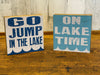 5 Inch White and Blue Wooden Square Block Signs Featuring "Go Jump in the Lake" and "On Lake Time" Phrase