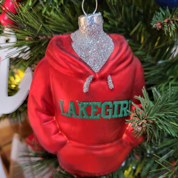Glass Ornament Featuring Red Sweatshirt with Green "Lakegirl" Sentiment