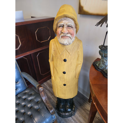 50 Inch Resin Figurine Featuring Old Sailor Wearing a Yellow Suite and Hat with Black Boots 