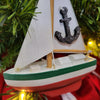 Red, White, and Green Christmas Ornament Featuring Sailboat Design With White Sail with Anchor Design