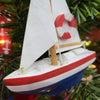 Red, White, and Blue Christmas Ornament Featuring Sailboat Design With White Sail with Life Ring Design
