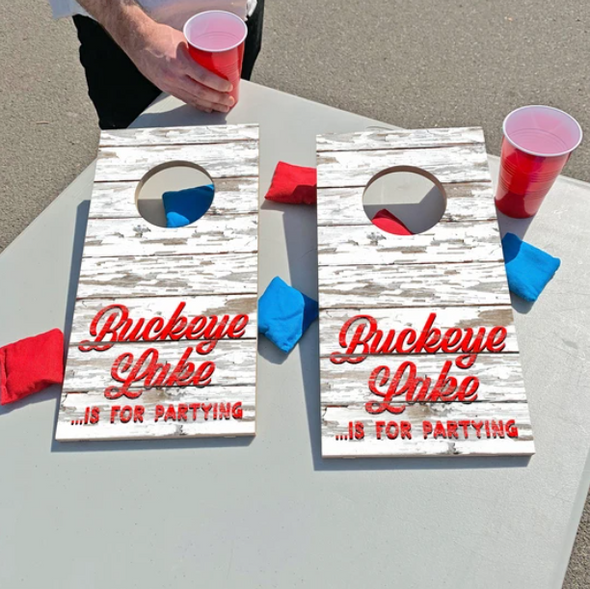 Distressed White Tabletop Corn Hole With Red Phrase Buckeye Lake is for Partying